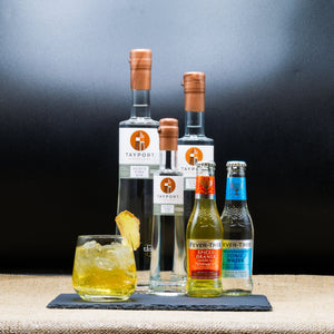 A Bottle Of Gin, Vodka, And Lemonade