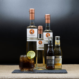 Vodka and a glass of soda on a table